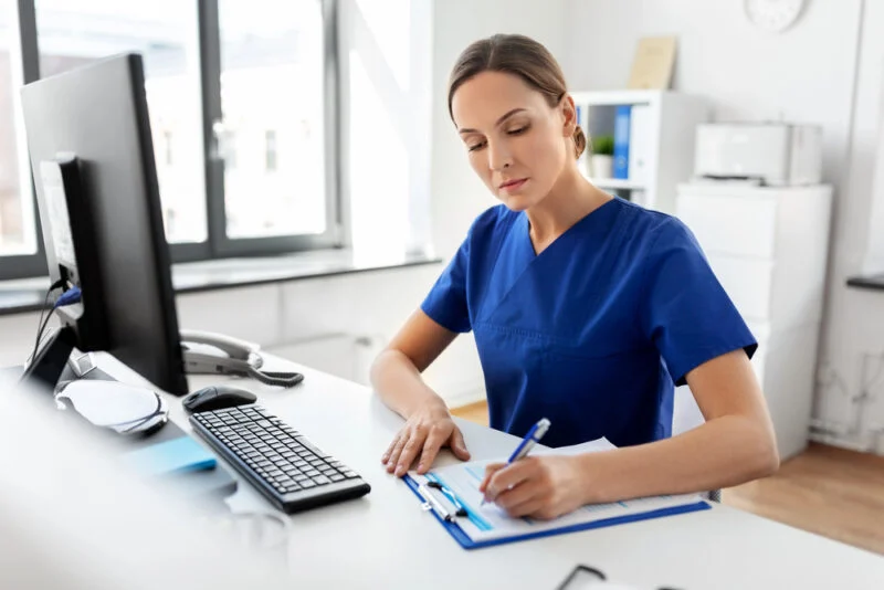 Depositphotos_371510258_S-800×534 Student completing an NCLEX exam practice test while learning computer adaptive testing strategies through Aceso Institute of Health Professions' Florida Board of Nursing-approved NCLEX Review Courses.