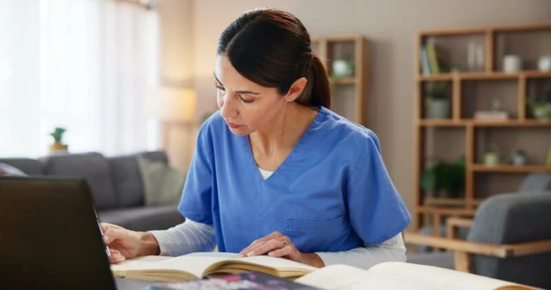 Nursing student celebrating successful completion of NCLEX preparation while applying proven test-taking strategies